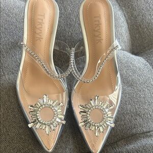 Cleared pointed Women's Heels with rhinestones